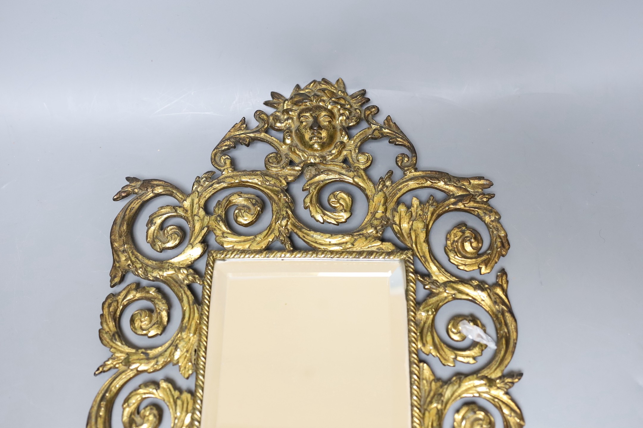 A late 19th century small brass framed girandole 41cm long